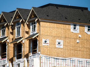 Homes under construction in British Columbia. Housing starts rose eight per cent in February from the month before.