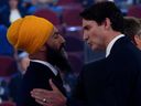 Liberal leader Justin Trudeau, right, and NDP leader Jagmeet Singh shake hands following a leaders' debate during the 2019 federal election. The NDP have agreed to support the Liberal government until 2025. 
