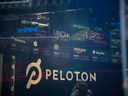 A monitor displays Peloton Interactive Inc. signage during the company's initial public offering at the Nasdaq MarketSite in New York, U.S.