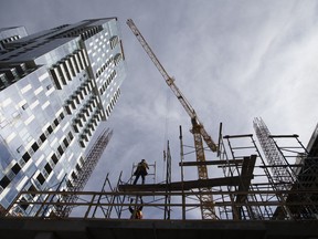 A construction worker on a condominium building under construction in downtown Montreal.