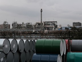 Oil drums near industrial plants and manufacturing facilities in the Keihin industrial area in Kawasaki, Kanagawa Prefecture, Japan.