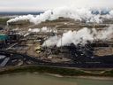 The Suncor oilsands processing plant near the Athabasca River at their mining operations near Fort McMurray, Alberta. The federal government is set to unveil details of its plan to slash Canada's greenhouse gas emissions over the next three decades.