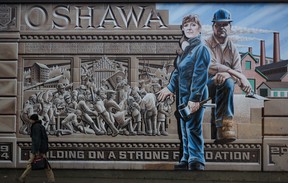 A mural in Oshawa, Ontario. depicts the citys more than century-long history of making automobiles.