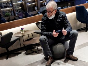 Sanctioned Russian oligarch Roman Abramovich sits in a VIP lounge before a jet linked to him took off for Istanbul from Ben Gurion international airport in Lod near Tel Aviv, Israel this week.