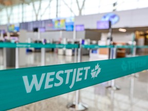 A WestJet check-in area at the Calgary International Airport.
