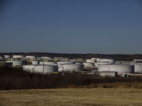Oil storage tanks in Alberta. The physical capacities of oil, natural gas and coal cannot be replaced by the low-punch energy density of renewables.