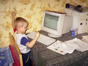 Vitalik Buterin and his first computer.