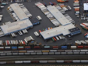 Truck trailers sit idle at a rail yard on November 20, 2021 in Surrey, British Columbia.
