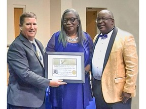 Chris Brown (Senior Manager of Community Relations at Enviva) accepts award from Deborah Dicks Maxwell (President of North Carolina NAACP) and Dr. Kennedy Barber (President of Bertie County NAACP).