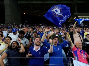 Chelsea fans celebrate after the team won the Champions League in 2021.