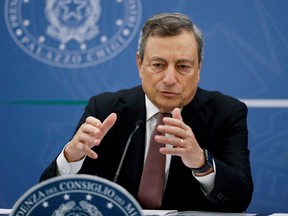 Italy's Prime Minister Mario Draghi speaks during a joint news conference in Rome, Sept. 29, 2021.