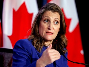 Finance Minister Chrystia Freeland gestures as she speaks during a news conference in Ottawa, April 7, 2022.
