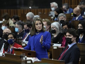 Finance Minister Chrystia Freeland tables the federal budget in the House of Commons as Prime Minister Justin Trudeau looks on in Ottawa, April 7, 2022.