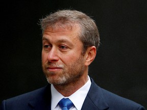 Russian billionaire and owner of Chelsea football club Roman Abramovich arrives at a division of the High Court in central London on Oct. 31, 2011.