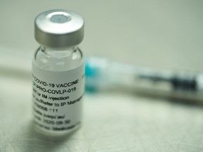 A vial of a plant-derived COVID-19 vaccine candidate developed by Medicago.