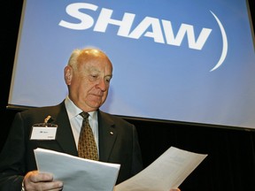 Shaw Communications chairman JR Shaw reviews his notes before speaking to shareholders at the company's annual meeting in Calgary on Jan. 11, 2007.