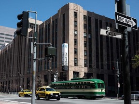 A streetcar goes past the Twitter headquarters in San Francisco, California, on Tuesday.