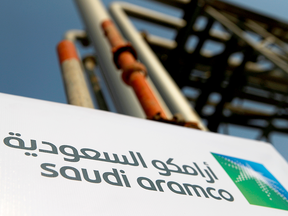 The Saudi Aramco logo is pictured at the oil facility in Abqaiq, Saudi Arabia. Saudi Aramco recently became the world's most valuable company.