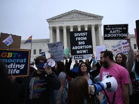 Pro-life and pro-choice demonstrators gather in front of the U.S. Supreme Court in Washington, D.C., on May 3, 2022.