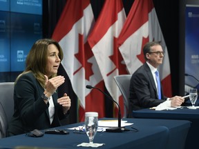 Carolyn Rogers, Senior Deputy Governor of the Bank of Canada, with Governor Tiff Macklem at a press conference in Ottawa.
