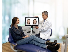 Pictured: Doctor delivering an Invisalign treatment consultation using Align's Invisalign Outcome Simulator Pro tool on an iTero Element 5D Plus imaging system. The iTero Element Plus Series imaging system requires a full barrier wand sleeve and clip on vent cover in the United States.