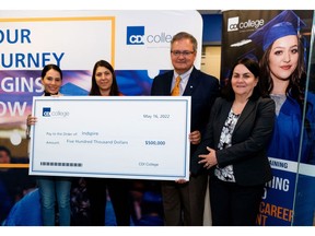 Representatives of CDI College present $500K cheque to Indspire CEO Mike DeGagné and VP Cindy Ball.