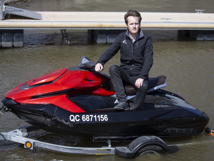 Samuel Bruneau, co-founder and chief executive officer of Taiga Motors Corp., on an electric personal watercraft in Lachine, Que.