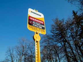 A signpost marks the presence of Enbridge's Line 5 pipeline, in Sarnia, Ont.