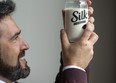 Pierre Morin, vice-president of Research and Innovation for Danone Canada, shows the new plant-based Silk Next Milk.