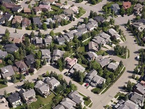 Canada Mortgage and Housing Corp. says the annual pace of housing starts in May was up eight per cent compared with April. An aerial view of housing is shown in Calgary on June 22, 2013.
