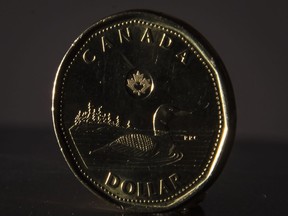 The Canadian dollar coin is pictured in North Vancouver, B.C. Wednesday, May 29, 2019.