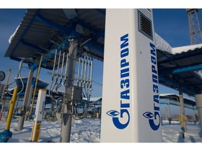 A company logo sits on a marker post in the yard at the Gazprom PJSC Atamanskaya compressor station, part of the Power Of Siberia gas pipeline, near Svobodny, in the Amur region, Russia, on Wednesday, Dec. 11, 2019. The pipeline, which runs from Russia's enormous reserves in eastern Siberia and will eventually be 3,000 kilometers (1,900 miles) long, will help satisfy China's vast and expanding energy needs.