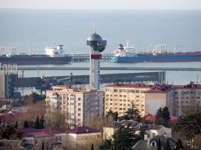 A tanker sits moored dockside at the port, operated by Tuapse Commercial Sea Port JSC, in Tuapse, Russia, on Monday, March 23, 2020. Major oil currencies have fallen much more this month following the plunge in Brent crude prices to less than $30 a barrel, with Russia's ruble down by 15%.