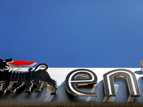 The ENI SpA logo sits on the company's gas station in Rome, Italy, on Friday, April 24, 2020. Eni reported a 94% drop in first-quarter profit and cut its production forecast for the year as demand is crushed by the coronavirus pandemic. Photographer: Alessia Pierdomenico/Bloomberg