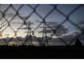 Electricity transmission pylons in Brighton, U.K. Photographer: Chris Ratcliffe/Bloomberg