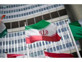 VIENNA, AUSTRIA - MAY 24: The flag of Iran is seen in front of the building of the International Atomic Energy Agency (IAEA) Headquarters ahead of a press conference by Rafael Grossi, Director General of the IAEA, about the agency's monitoring of Iran's nuclear energy program on May 24, 2021 in Vienna, Austria. The IAEA has been in talks with Iran over extending the agency's monitoring program. Meanwhile Iranian and international representatives have been in talks in recent weeks in Vienna over reviving the JCPOA Iran nuclear deal.