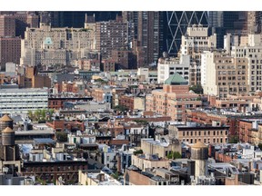 Buildings in New York, U.S., on on Monday, July 5, 2021. New York's residential market is heating back up amid the easing of commercial restrictions and lower Covid-19 rates, although the market has yet to return to pre-pandemic levels, Forbes reports. Photographer: Jeenah Moon/Bloomberg
