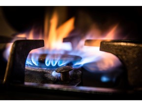 Gas burns on a domestic oven hob in the Molins de Rei district of Barcelona, Spain, on Thursday Sept. 23, 2021. Energy prices are soaring from the U.S. to Europe and Asia as economies emerge from the pandemic and people return to the office. Photographer: Angel Garcia/Bloomberg