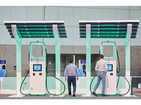 Electrify America electric vehicle (EV) charging stations on display at AutoMobility LA ahead of the Los Angeles Auto Show in Los Angeles, California, U.S. Photographer: Bing Guan/Bloomberg