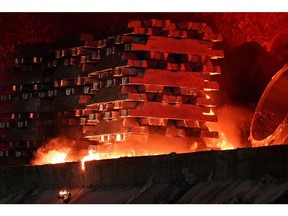 Aluminum ingots in a furnace at the Impol Seval AD Sevojno plant in Sevojno. Photographer: Oliver Bunic/Bloomberg