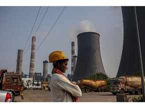 Cooling towers at the coal-fired NTPC Simhadri thermal power plant in Andhra Pradesh, India. Photographer: Dhiraj Singh/Bloomberg