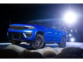 A Jeep Grand Cherokee 4xE electric vehicle (EV) is unveiled during the 2022 New York International Auto Show (NYIAS) in New York, U.S., on Wednesday, April 13, 2022. The NYIAS returns after being cancelled for two years due to the Covid-19 pandemic.