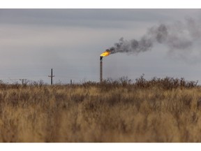 A natural gas flare stack at an oil well in Midland, Texas, U.S. on Monday, April 4, 2022. West Texas, the proud oil-drilling capital of America, is now also on the cusp of becoming the earthquake capital of America.