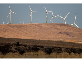 The TransAlta Cowley North wind farm near Cowley, Alberta, Canada, on Monday, April 25, 2022. Prime Minister Justin Trudeau's government wants a 42% reduction in emissions from the oil and gas sector as part of Canada's plan to meet its 2030 emissions-reduction goal.