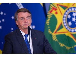 Jair Bolsonaro, Brazil's president, speaks during a press conference at Planalto Palace in Brasilia, Brazil, on Wednesday, May 25, 2022. Bolsonaro's decision to fire a third chief executive officer at Petrobras shows just how crucial it is for the Brazilian president to avoid another increase in fuel prices that could all but kill his re-election chances in October.