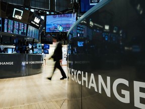 NEW YORK, NEW YORK - JUNE 10: Traders work on the floor of the New York Stock Exchange (NYSE) on June 10, 2022 in New York City. Stocks fell over 800 points on Friday as inflation fears continue to spook investors.