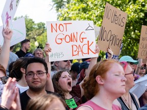 Abortion rights demonstrators chant outside the US Supreme Court in Washington, D.C., US, on Saturday, June 25, 2022. The US Supreme Court overturned the 1973 Roe v. Wade decision Friday and wiped out the constitutional right to abortion, issuing a historic ruling likely to render the procedure largely illegal in half the country.