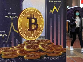 FILE - An advertisement for Bitcoin cryptocurrency is displayed on a street in Hong Kong, on Feb. 17, 2022. Europe is poised to take the global lead in regulating the freewheeling cryptocurrency industry at a time when prices have plunged, wiping out fortunes, fueling skepticism and sparking calls for tighter scrutiny. European Union negotiators were set to hold talks on Thursday, June 30, 2022, to hammer out the final details in the bloc's sweeping package of crypto rules.