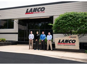 Mi-Jack Products acquires Yardeye GmbH. Executives from both companies stand in front of the Mi-Jack/Lanco world headquarters in Homewood, IL on May 31st, 2022. L-R: Jack Wepfer, VP of Finance and Accounting for Mi-Jack/Lanco, Stephan Trauth, Managing Director of Yardeye, Aaron Newton, VP of Sales for Mi-Jack, and Simon Fiera, VP of Technology for Mi-Jack.