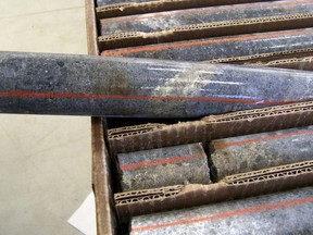 FILE - In this Oct. 4, 2011, photo, a core sample drilled from underground rock near Ely, Minn., shows a band of shiny minerals containing copper, nickel and precious metals, center, that Twin Metals Minnesota LLC, hopes to mine near the Boundary Waters Canoe Area Wilderness in northeastern Minnesota. The U.S. Forrest Service issued a draft environmental assessment Thursday, June 23, 2022, that backs a proposed 20-year moratorium on copper-nickel mining upstream from the Boundary Waters Canoe Area Wilderness.